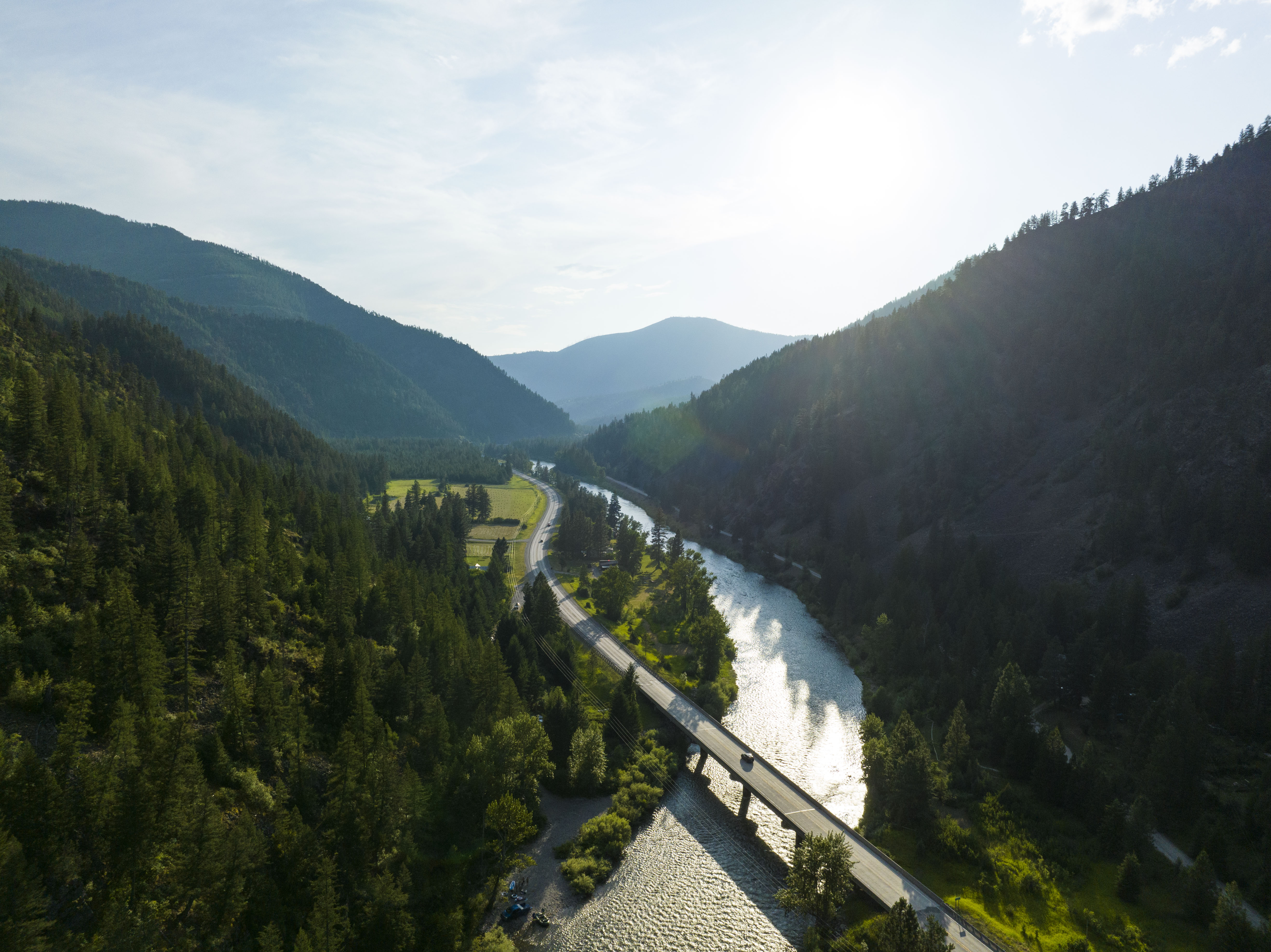 Aerial view of a a highway 200 bridge over the Blackfoot river in summer