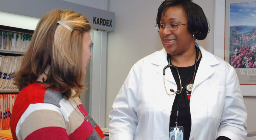 Doctor talking to patient
