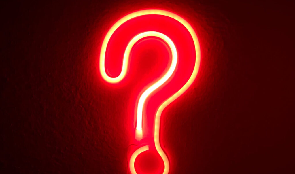 Neon glowing question mark