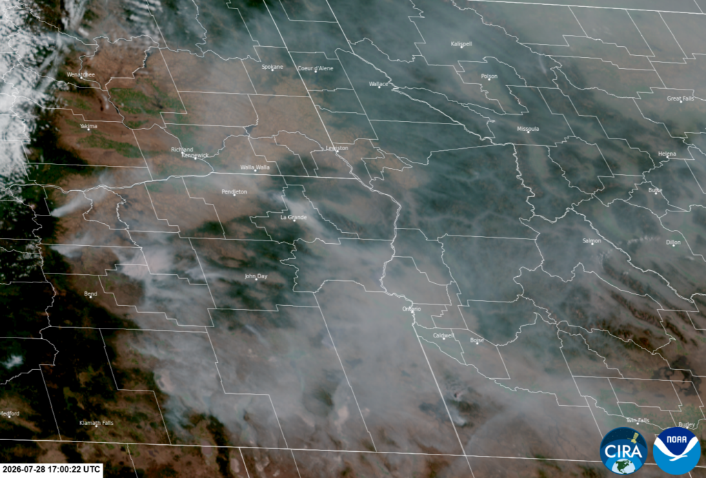 Satellite imagery showing wildfire smoke over Oregon, Washington, Idaho, and Montana.
