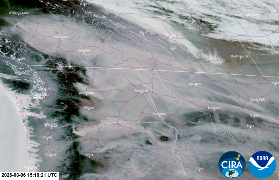 Satellite imagery of northwest US showing wildfire smoke over the area.